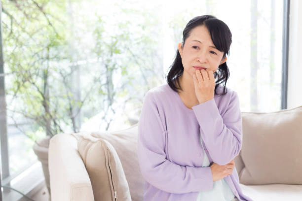 asian senior woman In the living room housewife stock pictures, royalty-free photos & images
