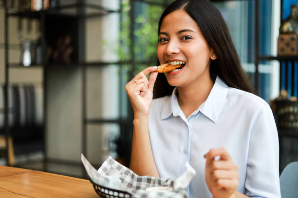 Asian woman in cafe stock photo