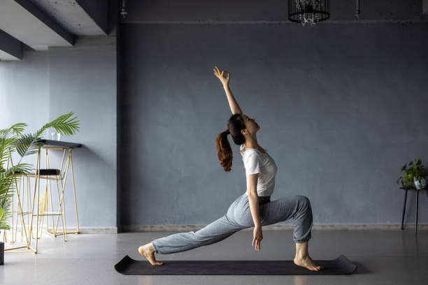 Asian women do yoga at home stock photo