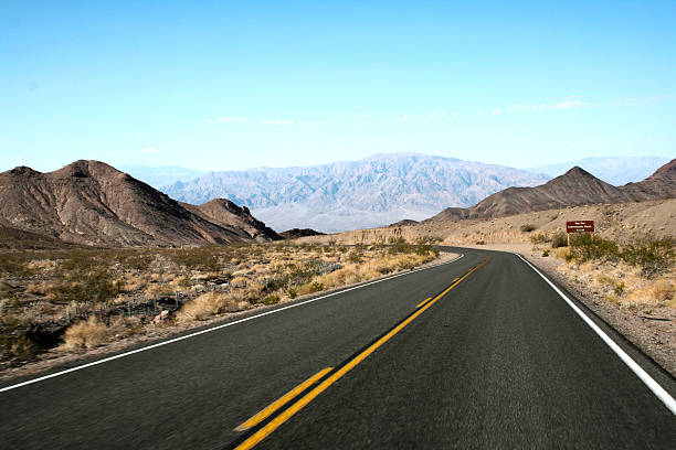 Asphalt way - Mountain road - Death valley stock photo