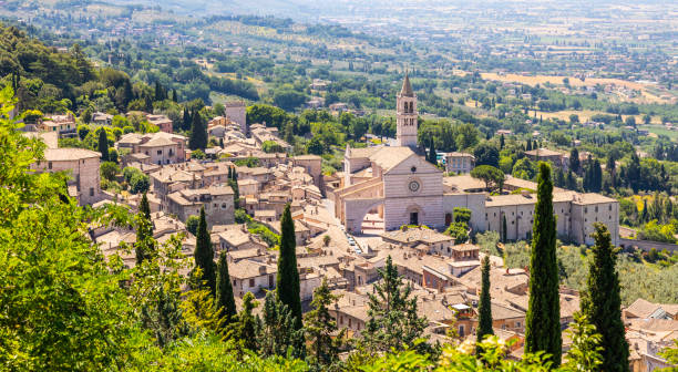 Assisi village in Umbria region, Italy. The town is famous for the most important Italian Basilica dedicated to St. Francis - San Francesco. stock photo