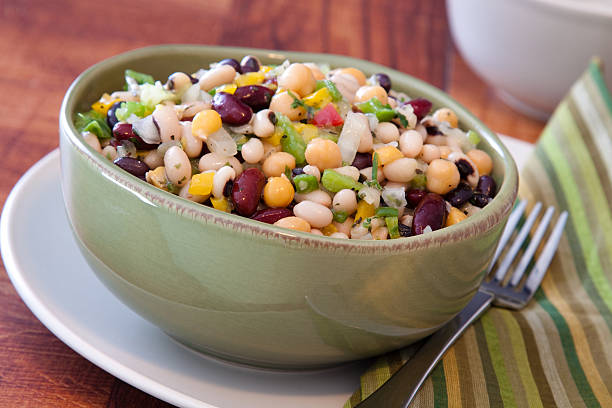 Assorted cold bean salad in a bowl stock photo