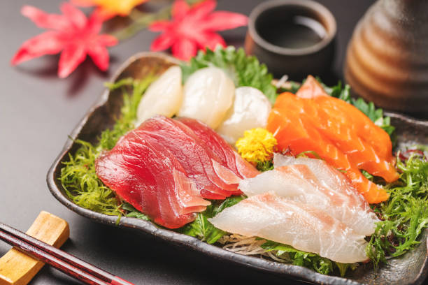 assorted sashimi on a black background stock photo