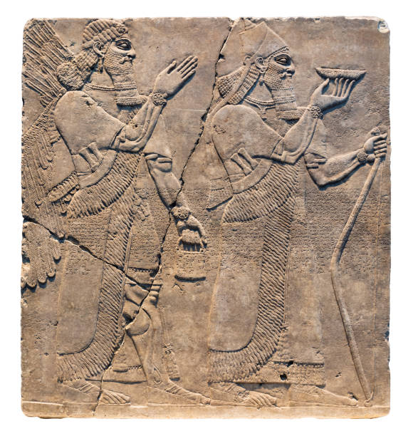 Assyrian art on the wall Assyrian art on the wall, King Ashurnasirpal II and genius. sumerian civilization stock pictures, royalty-free photos & images