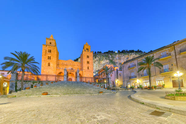 Astonishing evening view on  Cathedral-Basilica of Cefalu or Duomo di Cefalu and square Piazza del Duomo stock photo