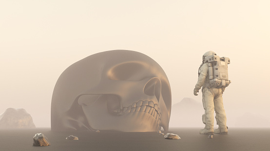 Astronaut finding a giant skull on a remore planet
