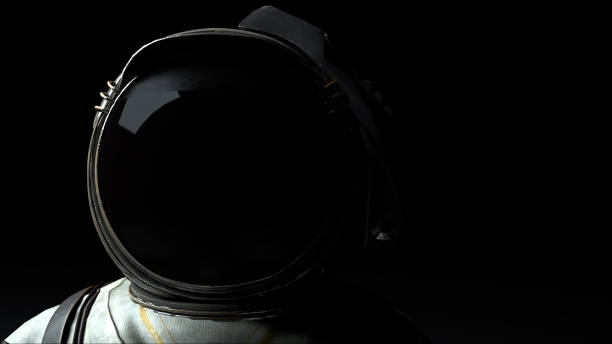astronaut in een metalen helm close-up in het licht en donker. door de computer gegenereerde ruimte achtergrond, 3d-rendering - astronaut stockfoto's en -beelden