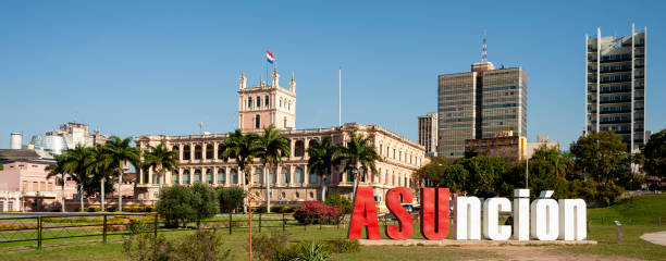 Asuncion sign with palace in the background. stock photo