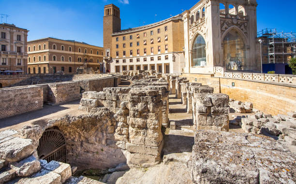 At the Roman amphitheater in Piazza Sant'Oronzo in Lecce Apulia Italy At the Roman amphitheater in Piazza Sant'Oronzo in Lecce Apulia Italy lecce stock pictures, royalty-free photos & images