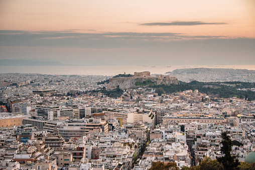 A beautiful view of the city of Athens, Greece, as seen from the top of the Lycabettus hill at sunset