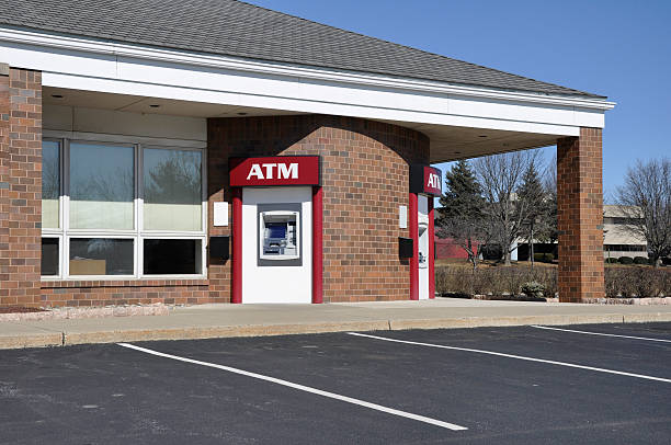 atm machine outdoor atm or automated teller machine banks and atms stock pictures, royalty-free photos & images
