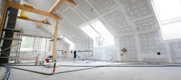 Attic finishing in the phase drywall spackling and plastering stock photo
