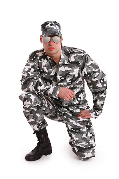 Attractive soldier on white background stock photo
