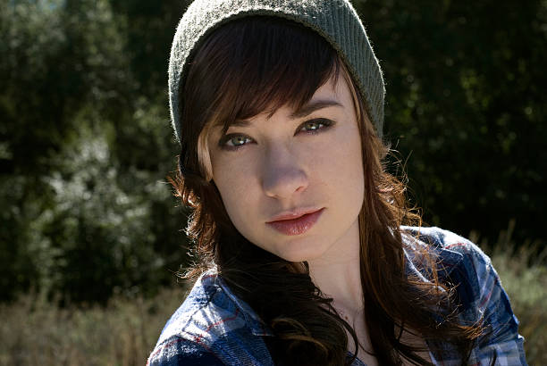 Attractive young woman in a beanie stock photo