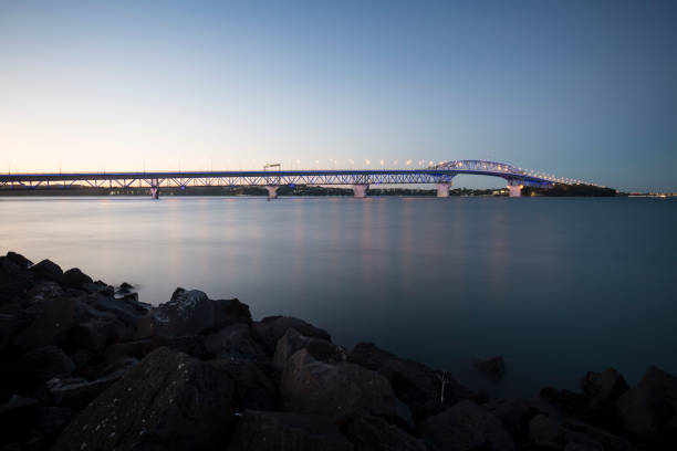 Auckland Harbour Bridge at night in New Zealand stock photo