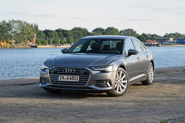Audi A6 on the road Usedom, Germany - 14th June, 2018: Audi A6 stopped on the road. The Audi is one of the most popular premium cars brand in the world. audi photos stock pictures, royalty-free photos & images