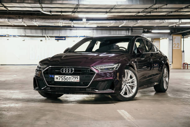 Moscow. Russia - January 16, 2020: Audi A7 Sportback Ultra Nova GT 1 of 111 A purple-colored premium car stands in the parking lot.  Front view stock photo