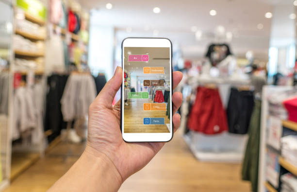 augmented reality marketing . hand holding smart phone use ar application to check information - store render imagens e fotografias de stock