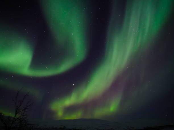 aurora borealis around Kilpis - 26 near Kilpisjärvi lake, in Lapland, Finland kilpisjarvi lake stock pictures, royalty-free photos & images