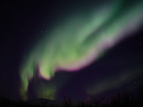 aurora borealis around Kilpis - 33 near Kilpisjärvi lake, in Lapland, Finland kilpisjarvi lake stock pictures, royalty-free photos & images