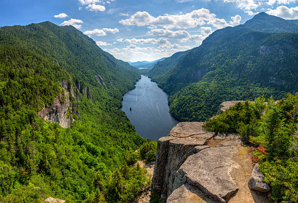 Ausable Lake Summer Panorama A magnificent view of Lower Ausable Lake from the Indian Head Lookout in the high peaks region of the Adirondack Mountains of New York. state park stock pictures, royalty-free photos & images
