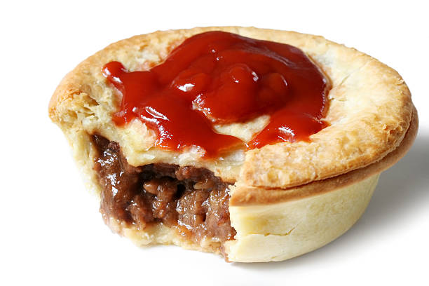 Aussie Meat Pie and Sauce  meat pie stock pictures, royalty-free photos & images