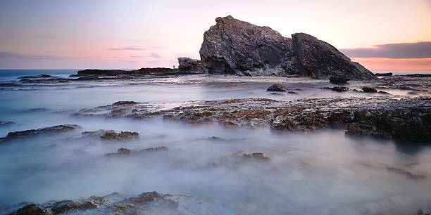 Australia Landscape : Currumbin Rock at dawn stock photo