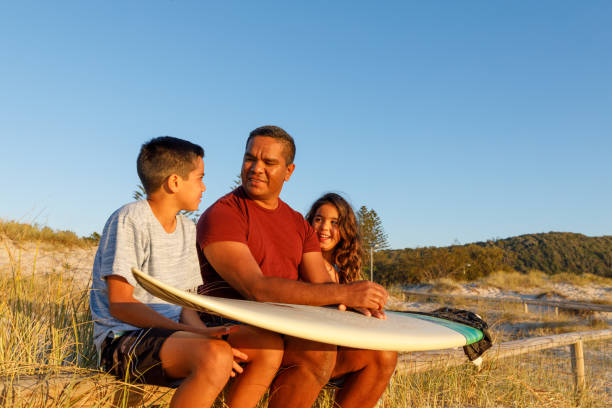Australian Aboriginal Father and Children stock photo