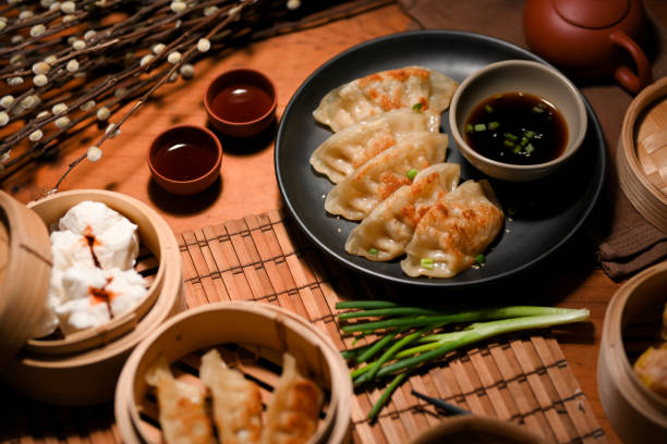 Authentic Chinese cuisine concept with fried dumpling or gyoza stock photo
