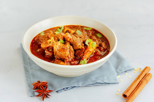 Authentic Lamb Vindaloo Traditional Fiery Red Indian / Goan Curry of Lamb stock photo