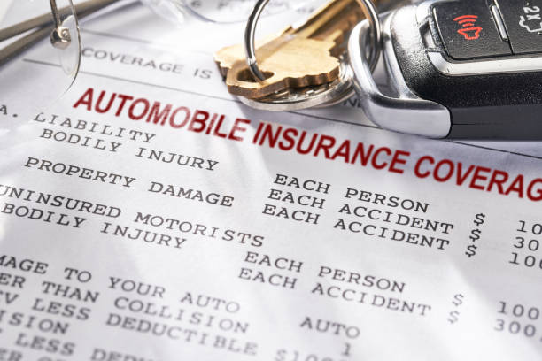 Auto and Car Insurance policy with keys stock photo