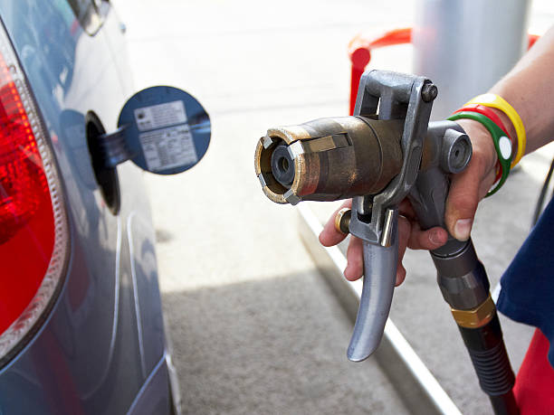 LPG auto gas refueling on petrol station stock photo