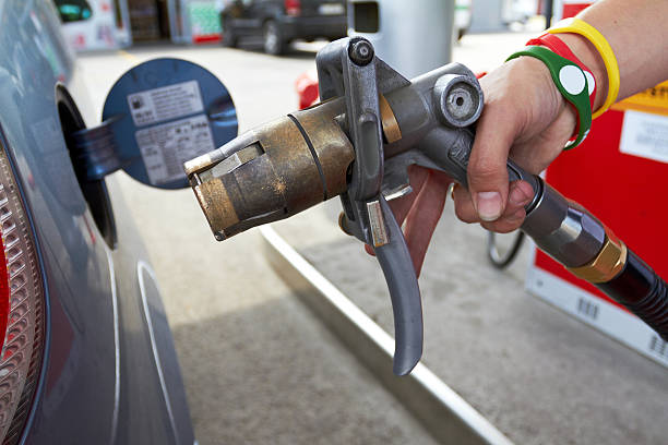 LPG auto gas refueling on petrol station stock photo