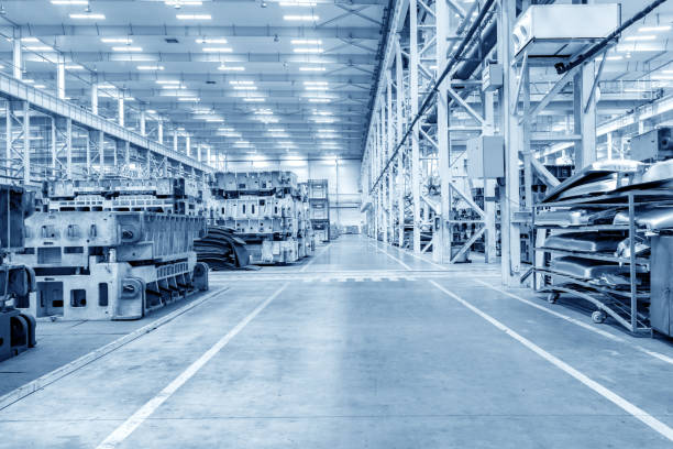Automobile factory warehouse The interior of a big industrial building or factory with steel constructions car plant stock pictures, royalty-free photos & images