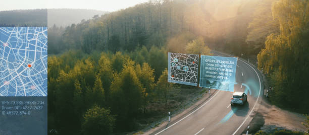 Autonomous Electric car driving on a forest highway with technology assistant tracking information, showing details. Visual effects clip - graphics are essential stock photo