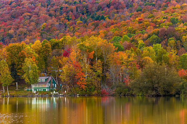 Autumn foliage and reflection in Vermont, Elmore state park stock photo