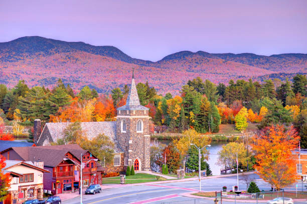 Autumn in Lake Placid, New York Lake Placid is a village in the Adirondack Mountains in Essex County, New York, United States. adirondack state park stock pictures, royalty-free photos & images
