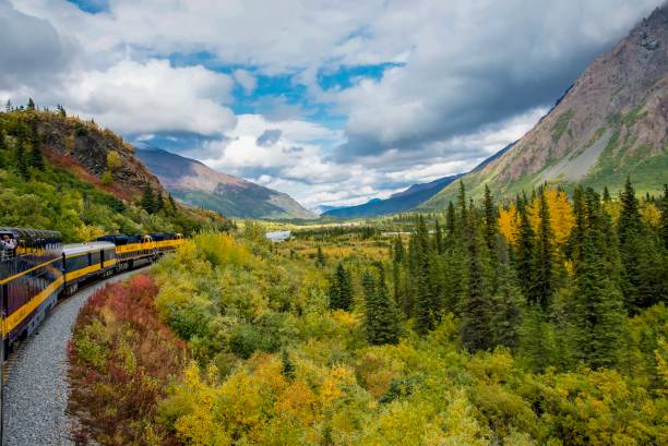 Autumn in the Alaska Range on railroad stock photo