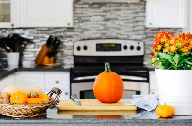Autumn pumpkin on the kitchen table stock photo
