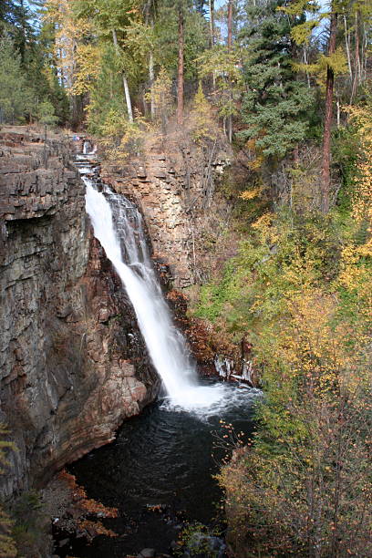 Autumn Waterfall in the forest in Marysville, BC, Canada stock photo