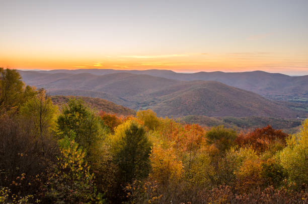 Autumnal Mountain Landscape at Sunset Majestic Sunset over an Autumnal Mountain Landscape from Mount Greylock. The Berkshires, MA. massachusetts stock pictures, royalty-free photos & images