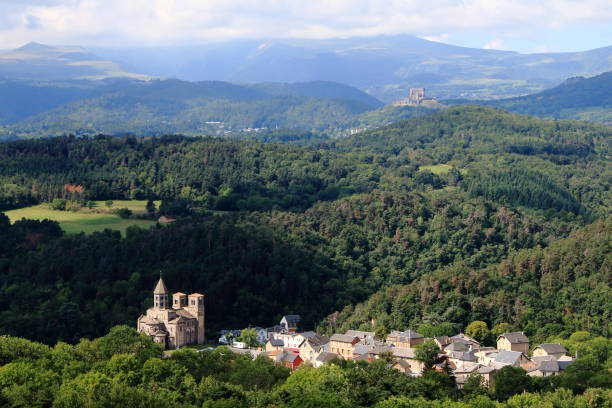 Auvergne landscape with Saint-Nectaire, Murol castle and the Sancy massif stock photo