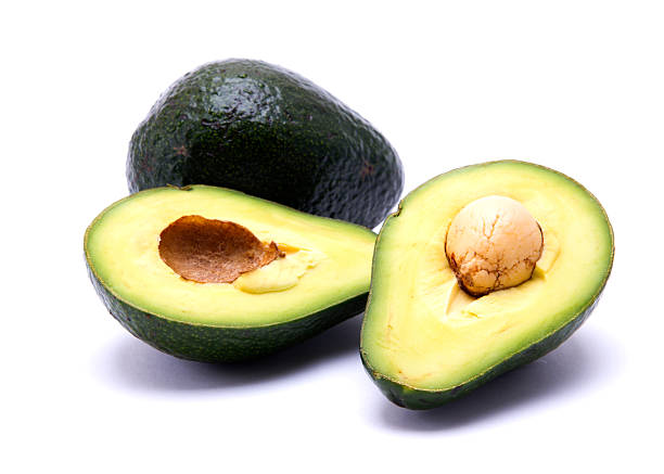 avacados on white background (foods to boost testosterone naturally)