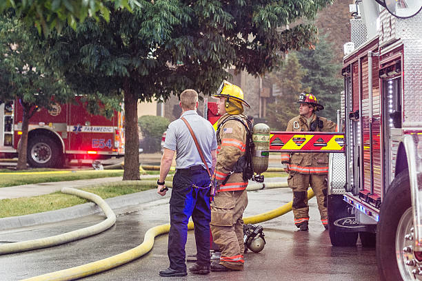 Avignon Apartment Fire in Olathe, Kansas Olathe, Kansas, USA — June 26, 2016: A two-alarm fire burns the upper floors of the Avignon apartment complex in 11600 Block of Greenwood in Olathe, Kansas on June 26, 2016. Olathe and Lenexa Fire Department's battle the blaze that began shortly before 5:00 PM. The cause of the fire was determined to be a lightining strike. (Joshua Santiago/Getty Images) olathe kansas stock pictures, royalty-free photos & images