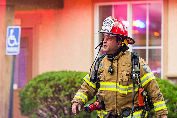 Avignon Apartment Fire in Olathe, Kansas Olathe, Kansas, USA — June 26, 2016: A two-alarm fire burns the upper floors of the Avignon apartment complex in 11600 Block of Greenwood in Olathe, Kansas on June 26, 2016. Olathe and Lenexa Fire Department's battle the blaze that began shortly before 5:00 PM. The cause of the fire was determined to be a lightning strike. (Joshua Santiago/Getty Images) olathe kansas stock pictures, royalty-free photos & images