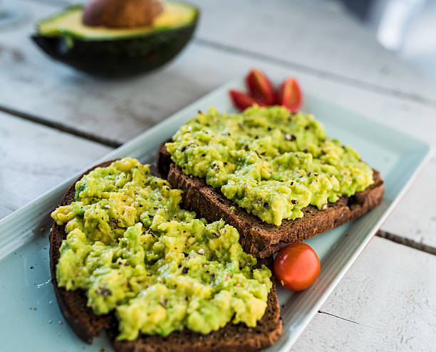 Avocado toast Avocado toast toasted bread stock pictures, royalty-free photos & images