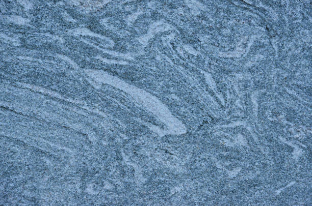 Azure granite wall background Granite wall with azure or bluish tint as background granitic stock pictures, royalty-free photos & images