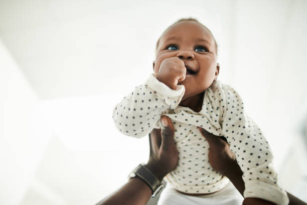 Babies are priceless gifts from above stock photo
