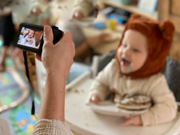 Baby boy birthday filming stock photo