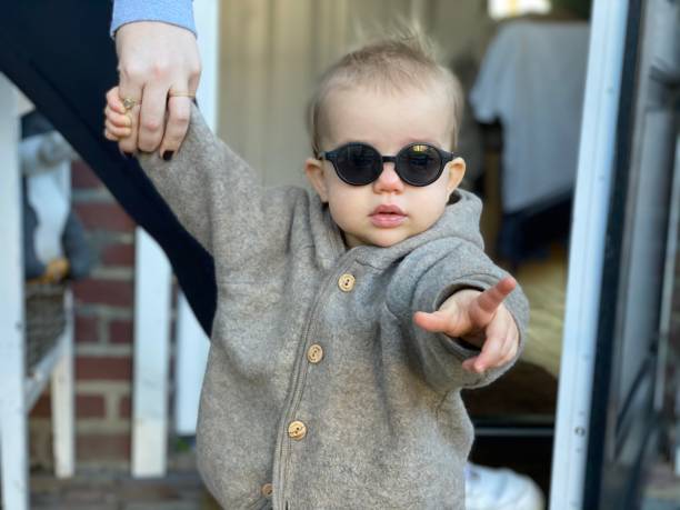 Baby girl with sunglasses stock photo